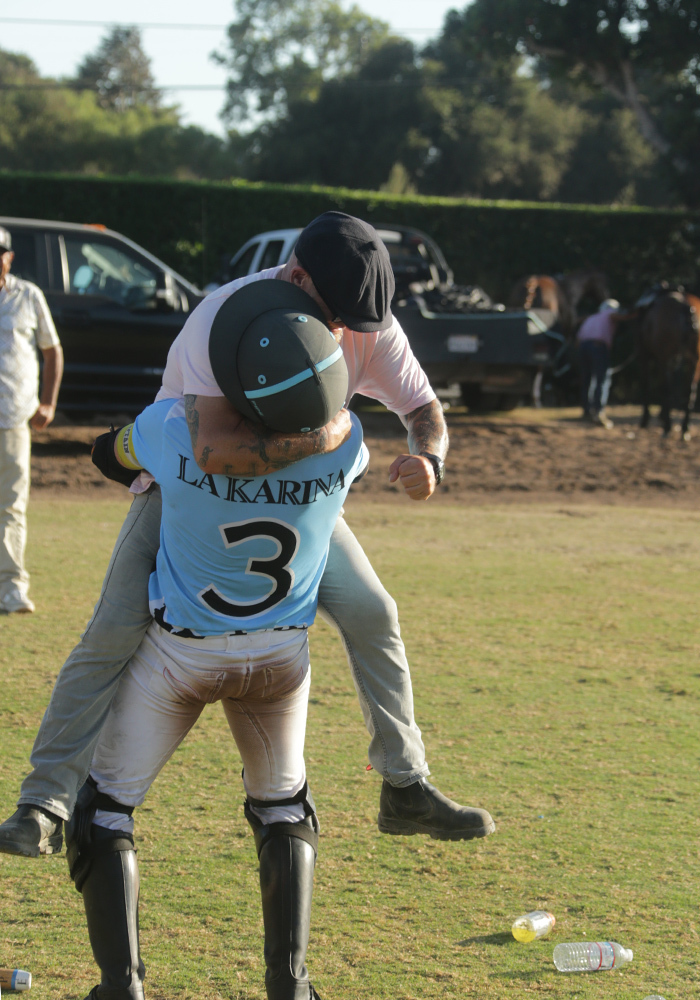 Felipe "Pipe" Vercellino embraces Team Manager Matthew Gonzalez following La Karina's first Pacific Coast Open victory.