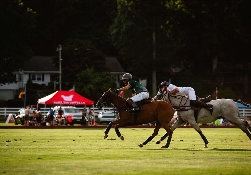 Cedar View's Drew Gale on a breakaway, GTFO's Zach Grob reaching for the hook.