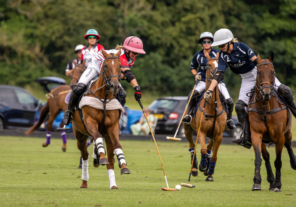 England's Lottie Lamacraft and USA's Kylie Sheehan battle for possession. ©Alice Gipps