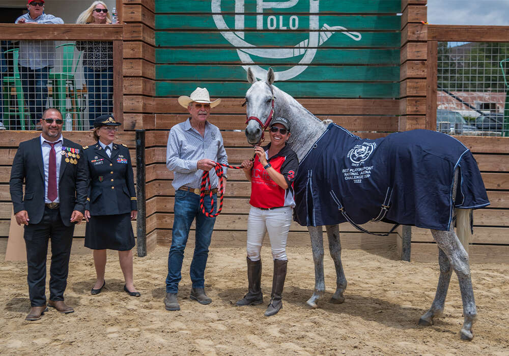 Best Playing Pony Atticus, played by Heather Perkins and owned by Danny Geiler. Presented by Major Marlene Miller and Hospital Corpsman Third Class Ivan Krimker.